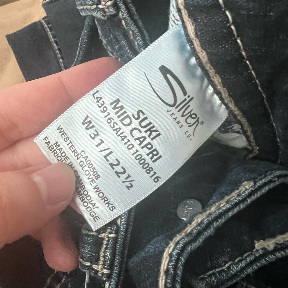 Size 31 waist Silver Capris.